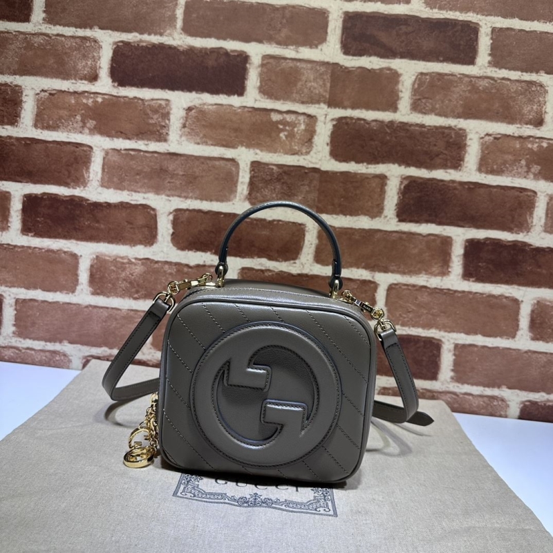 G*u*i top handle bags